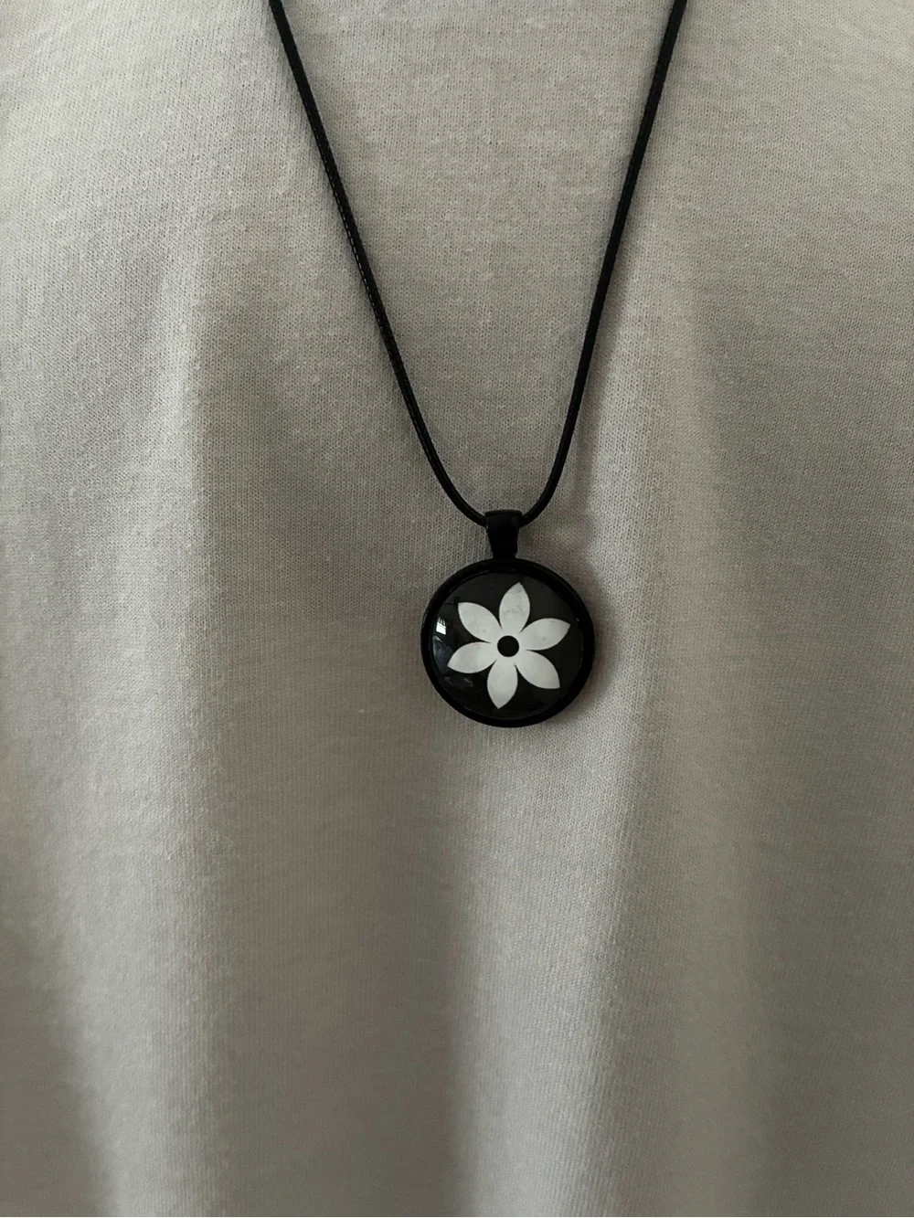 Hand Crafted Black Pendant Necklace with White Flower Motif